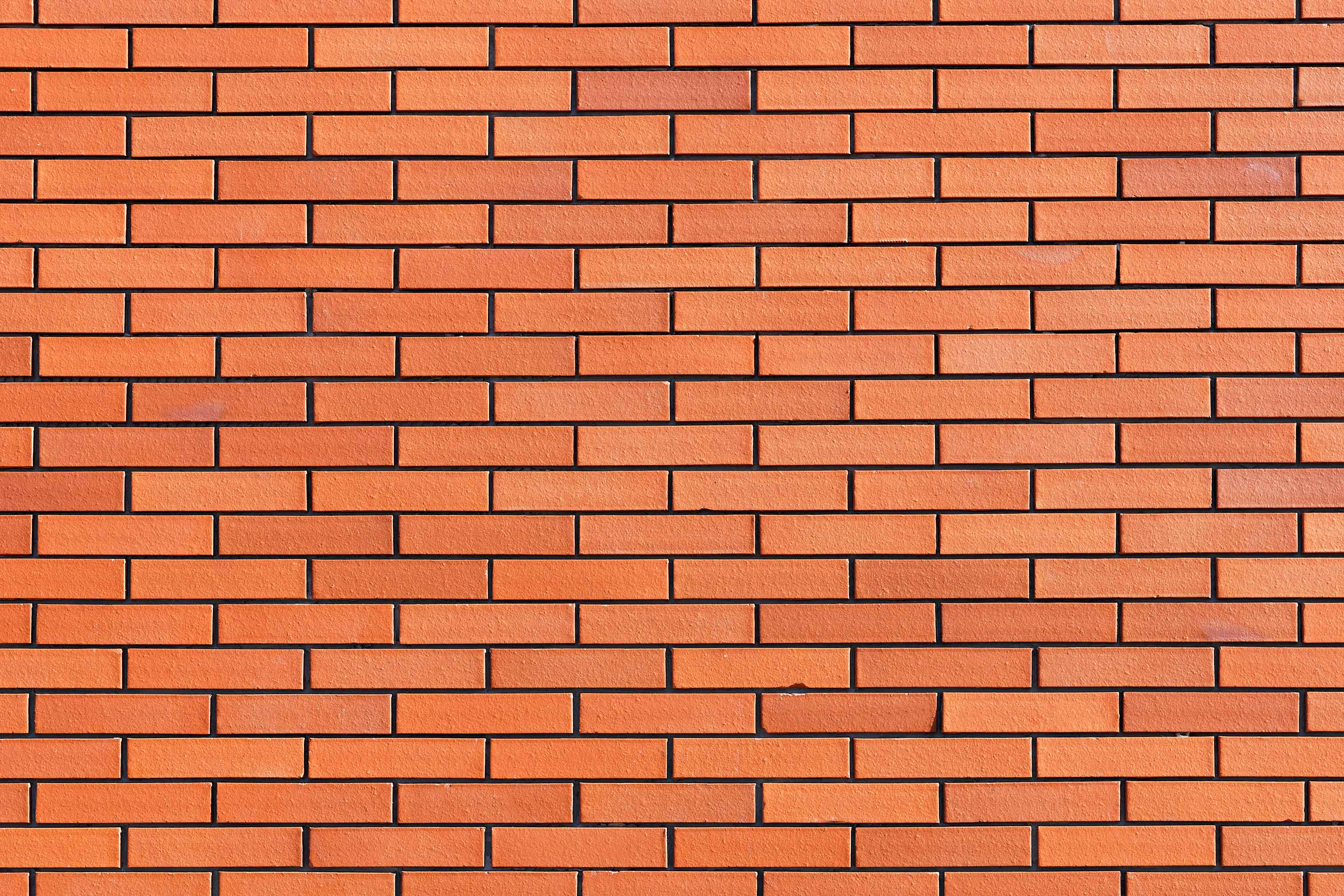 Ziegelsteinmauer III orange